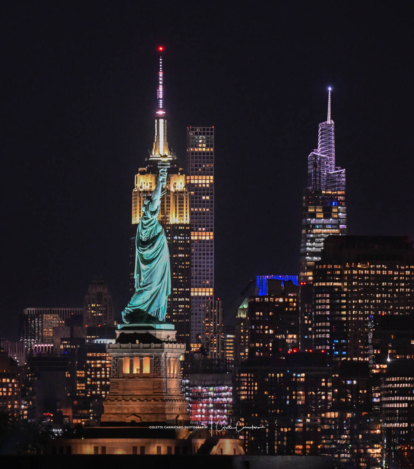 The Statue of Liberty all lined up with the Empire State Building.