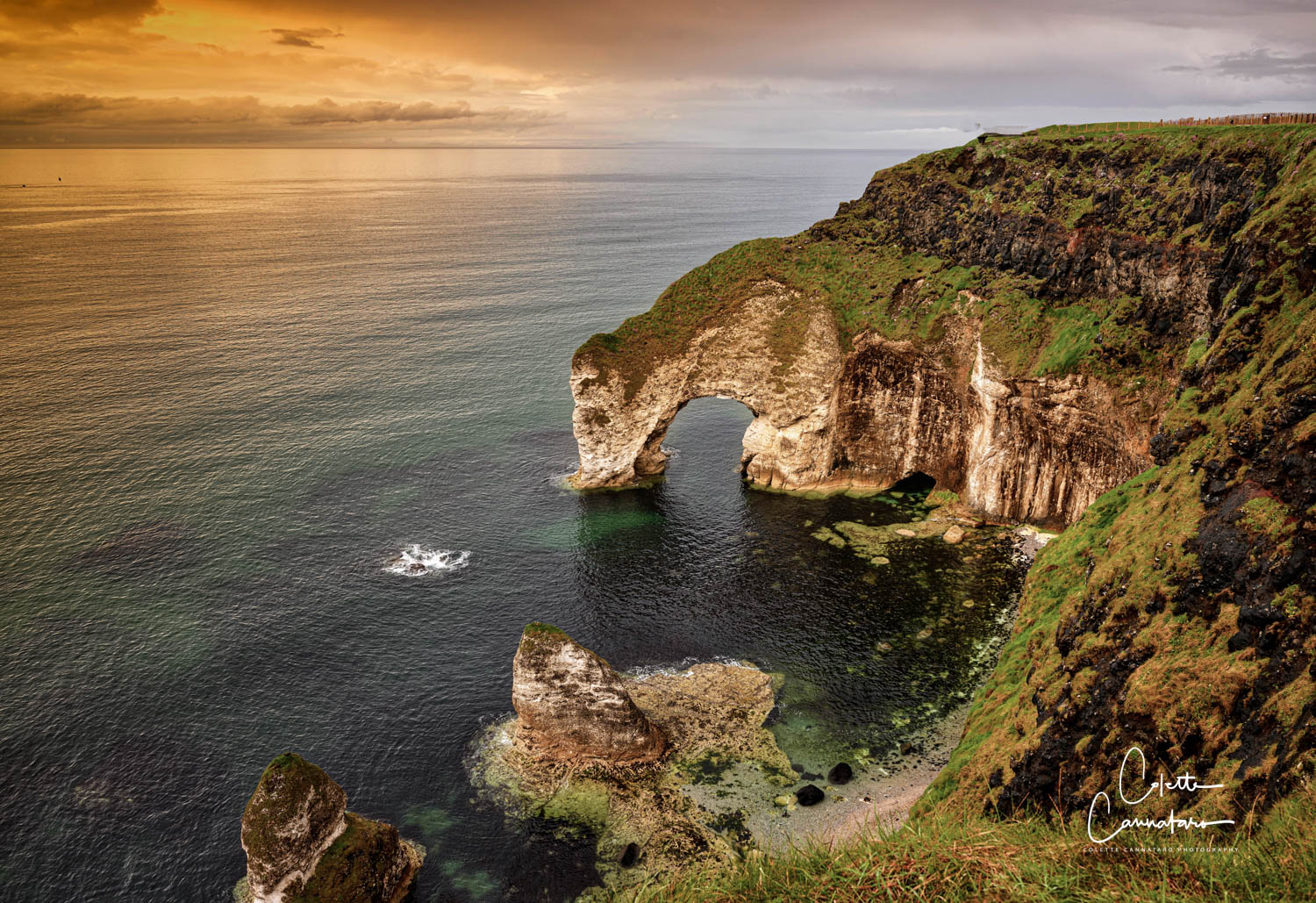 The Wishing Arch is located on Northern Ireland's Antrim Coast, with its breathtaking scenery and turquoise waters.